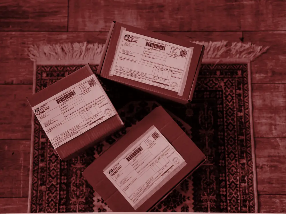 Shipping boxes on a rug