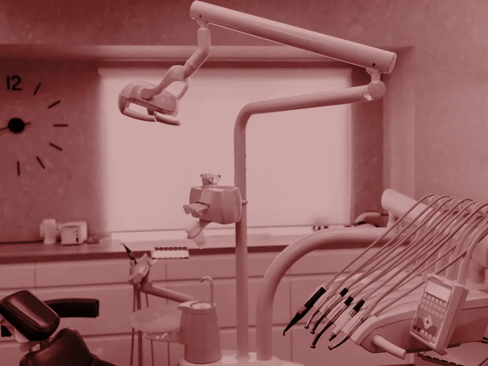 Modern dental treatment room with a dental chair
